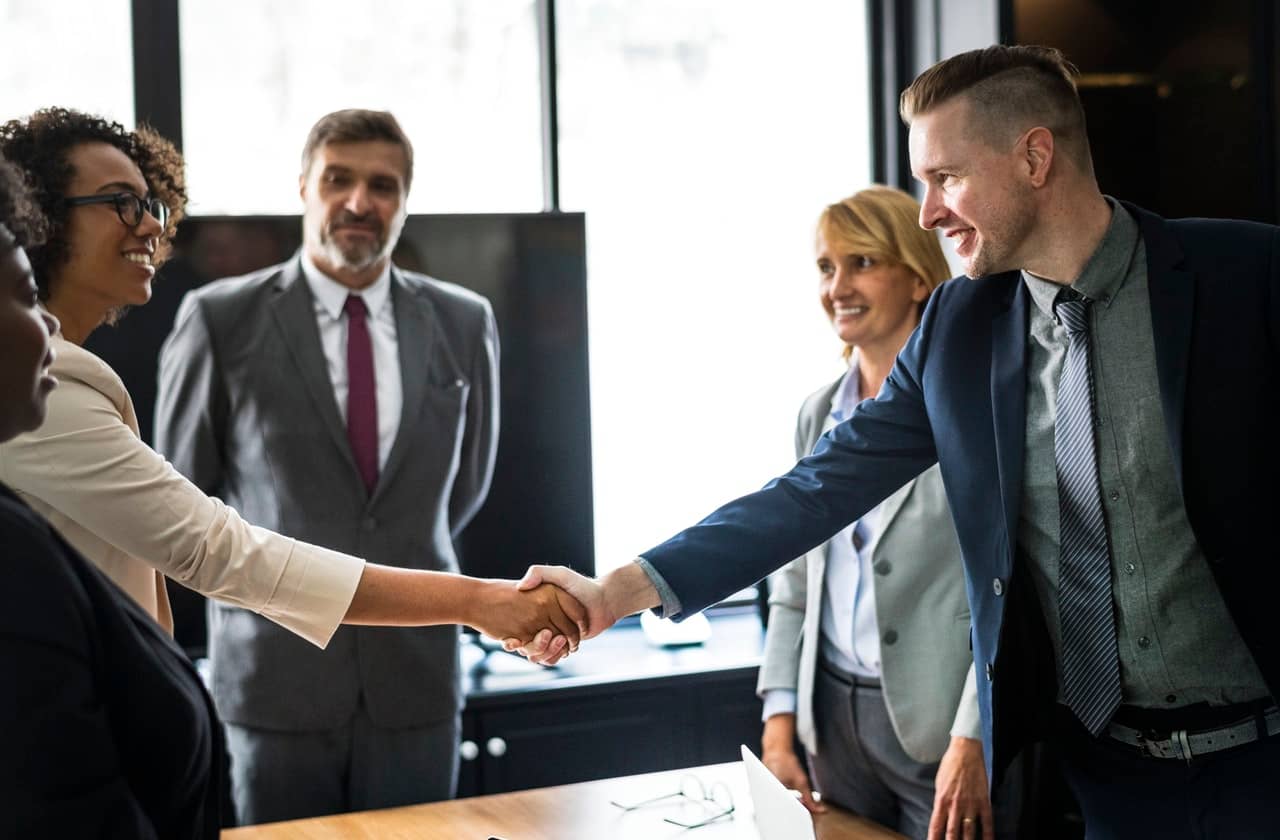 people shaking hands